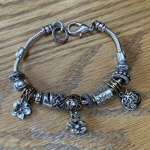 Elegant Silver and Gold Charm Bracelet